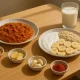 Spicy curry and pregnancy-safe foods on modern kitchen table