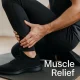 calf muscle cramp relief through massage in sports clothing