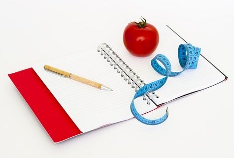 notebook tomatoes and ribbon