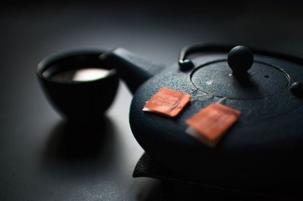 black teapot with cup