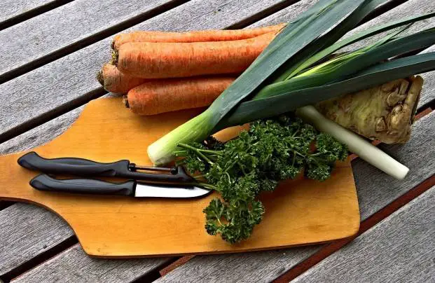 Fresh greens and raw carrots