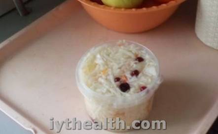 Sauerkraut with berries in plastic container