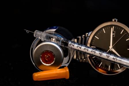 Syringe and clock